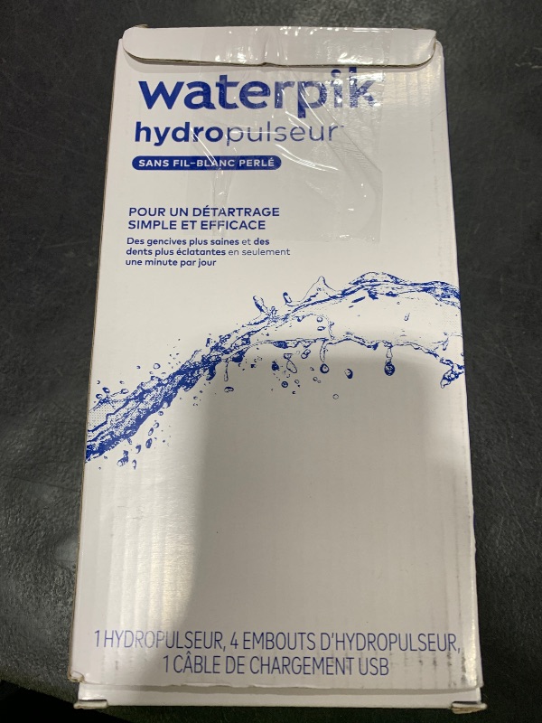 Photo 1 of Waterpik Cordless Pearl Rechargeable Portable Water Flosser for Teeth, Gums, Braces Care and Travel with 4 Flossing Tips - ADA Accepted, WF-13 White, Packaging May Vary