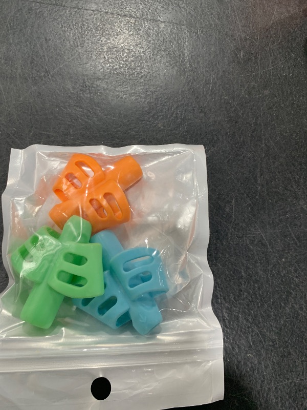 Photo 1 of JuneLsy Pencil Grips for Kids Handwriting Pencil gripper Pencil Holder Posture Correction Training Writing AIDS for preschooler Kids toddler Children Special Needs (3 PCS)