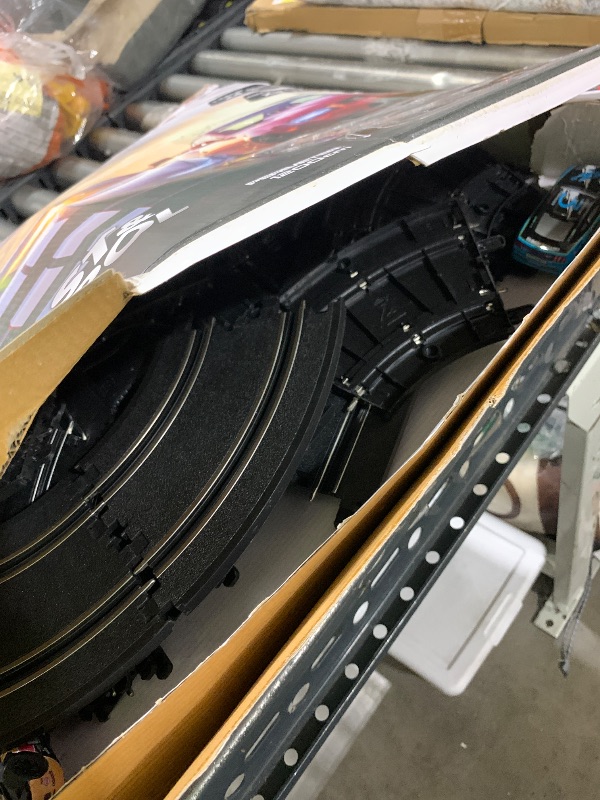 Photo 1 of Slot Car Racing Track for Kids 1:43 Electric Powered 40Ft Big Race Tracks Set with 4 Cars and 2 Hand Controllers