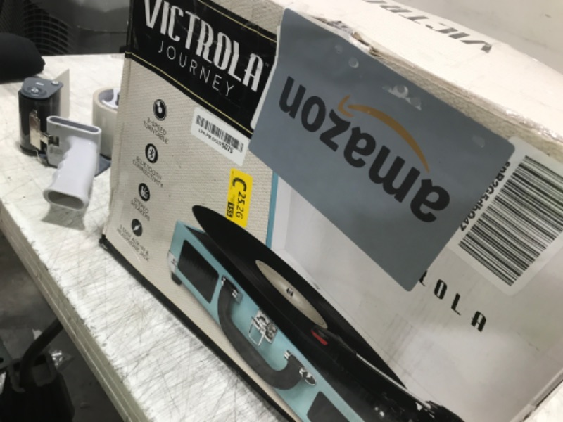 Photo 1 of Victrola Journey Bluetooth Portable Suitcase Record Player – with Built-in Speakers, 3 Speed Vinyl Record Player, RCA Out, Headphone Jack (Turquoise)