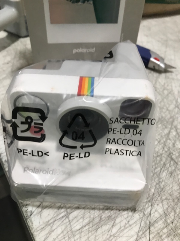 Photo 1 of Polaroid Now 3rd Generation I-Type Instant Camera + Film Bundle - Now Pebble White Camera + 16 Color Photos (6561)