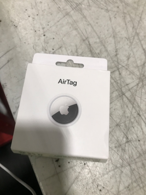 Photo 1 of Apple AirTag. Keep Track of and find Your Keys, Wallet, Luggage, Backpack, and More. Simple one-tap Set up with iPhone or iPad