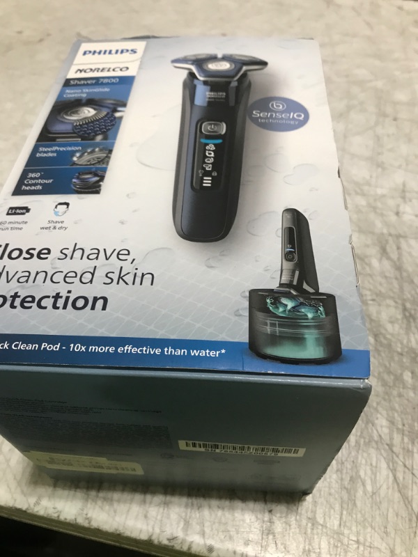 Photo 1 of Philips Norelco Shaver 7800, Rechargeable Wet & Dry Electric Shaver with SenseIQ Technology, Quick Clean Pod, Charging Stand, Travel Case and Pop-up Trimmer, S7885/85