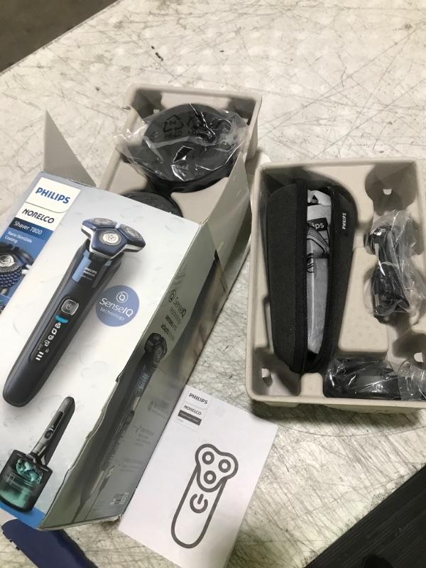 Photo 1 of Philips Norelco Shaver 7800, Rechargeable Wet & Dry Electric Shaver with SenseIQ Technology, Quick Clean Pod, Charging Stand, Travel Case and Pop-up Trimmer, S7885/85