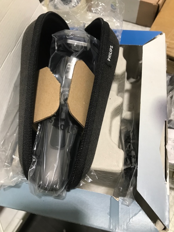 Photo 1 of Philips Norelco Shaver 7600, Rechargeable Wet & Dry Electric Shaver with SenseIQ Technology, Quick Clean Pod, Travel Case & Pop-up Trimmer, S7886/84