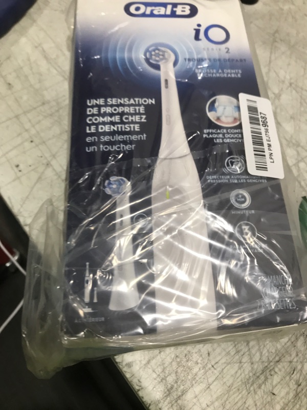 Photo 1 of Oral-B iO Series 2 Rechargeable Electric Powered Toothbrush Starter Kit, Pure White with 2 Brush Heads - Automatic Pressure Sensor to Protect Gums - 3 Modes - 2 Min Timer