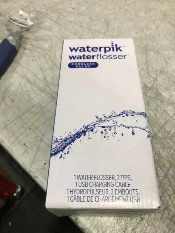 Photo 1 of Waterpik Cordless Pulse Rechargeable Portable Water Flosser for Teeth, Gums, Braces Care and Travel with 2 Flossing Tips, Waterproof, ADA Accepted, WF-20 Gray, Packaging May Vary
