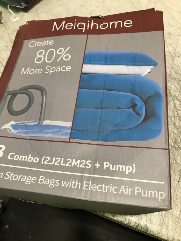 Photo 1 of Vacuum Storage Bags with Electric Air Pump 8 Combo (2 Jumbo/2 Large/2 Medium/2 Small), Plastic Packaging Bags,Travel Vacuum Bags For Luggage,Clothes, Pillows, Comforters, Blankets, Bedding