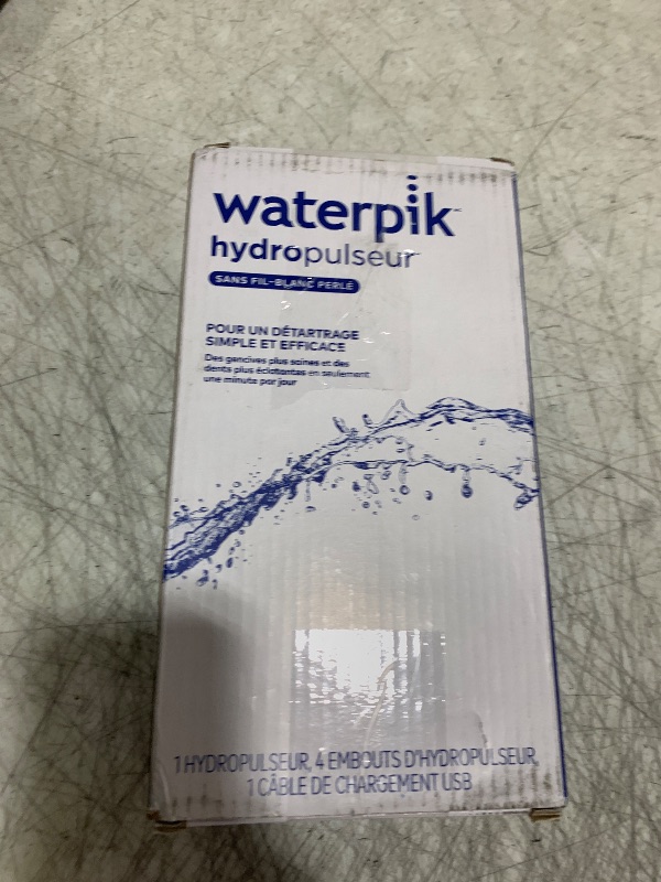 Photo 1 of Waterpik Cordless Pearl Rechargeable Portable Water Flosser for Teeth, Gums, Braces Care and Travel with 4 Flossing Tips - ADA Accepted, WF-13 White, Packaging May Vary