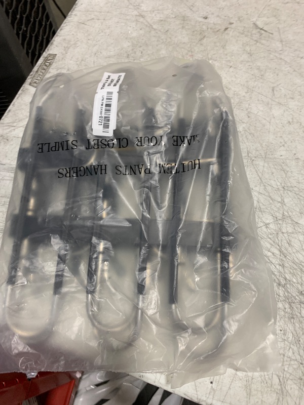 Photo 1 of HUITEM 4 Pack 6-Tier Space Saving Pant Hangers, Anti-Slip, Lightweight, Stainless Steel, Black, 6 Pairs Jeans Hangers