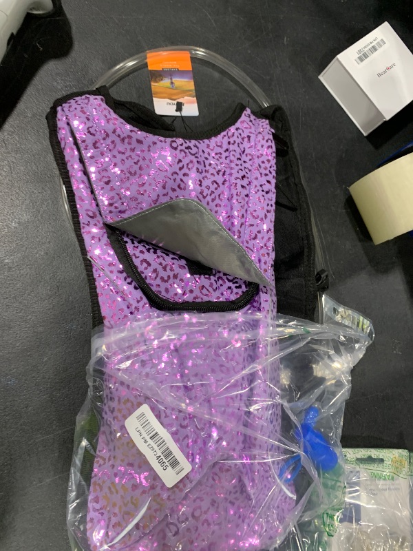 Photo 1 of KUYOU Rave Hydration Pack, Hydration Backpack with 2L Hydration Bladder, Festival Essential Water Backpack for Hiking, Running, Cycling, and Music Festivals