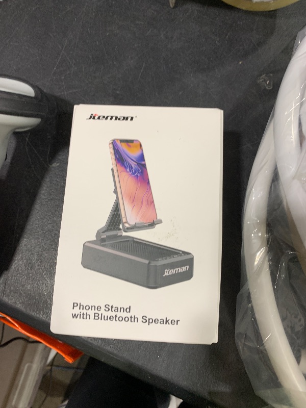 Photo 1 of Cell Phone Stand with Wireless Bluetooth Speaker and Anti-Slip Base HD Surround Sound Perfect for Home and Outdoors with Bluetooth Speaker for Desk Compatible with iPhone/ipad/Samsung Galaxy