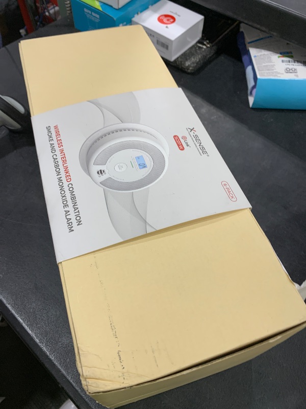 Photo 1 of X-Sense Wireless Interconnected Combination Smoke and Carbon Monoxide Detector with LCD Display & 10-Year Battery, Over 820 ft Transmission Range, 6-Pack