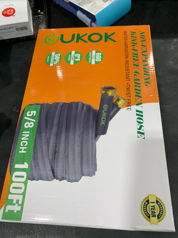 Photo 1 of GUKOK 2025 Upgraded 100FT Non-Expanding Garden Hose, Ultra-Light & Flexible Water Hose - Burst-Resistant, Kink-Free, High-Pressure, All-Weather Use for Lawns, Gardens, and Outdoor Cleaning