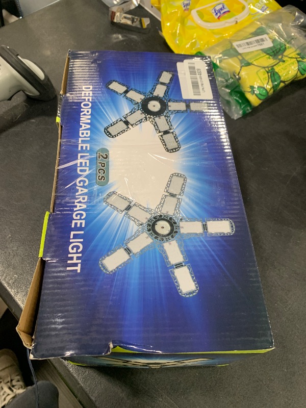 Photo 1 of Nexillumi 2-Pack Led Garage Light 180W, 36000LM Garage Lights Ceiling LED with E26/E27 Medium Base, 6000K Deformable LED Shop Lights with 10+1 Adjustable Panels for Garage, Workshop, Attic, Basemen