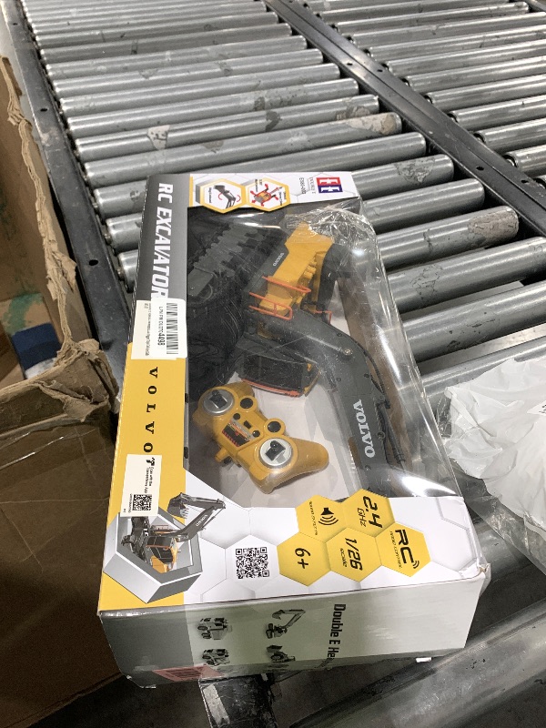 Photo 1 of DOUBLE E Volvo RC Excavator Remote Control Excavator Toy for Boys Full Function Construction Vehicles Toys with Shovel for Outdoor Play Sandbox Digger Toys Gifts for Kids