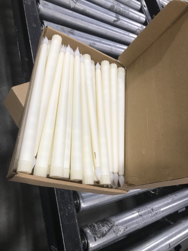 Photo 1 of Treela 24 Pcs Flameless Taper Candles Battery Operated Bulk Fake 11 Inch Candles Light LED Candlesticks Flickering Tapered for Wedding Halloween Christmas Decoration?(Ivory,Basic)