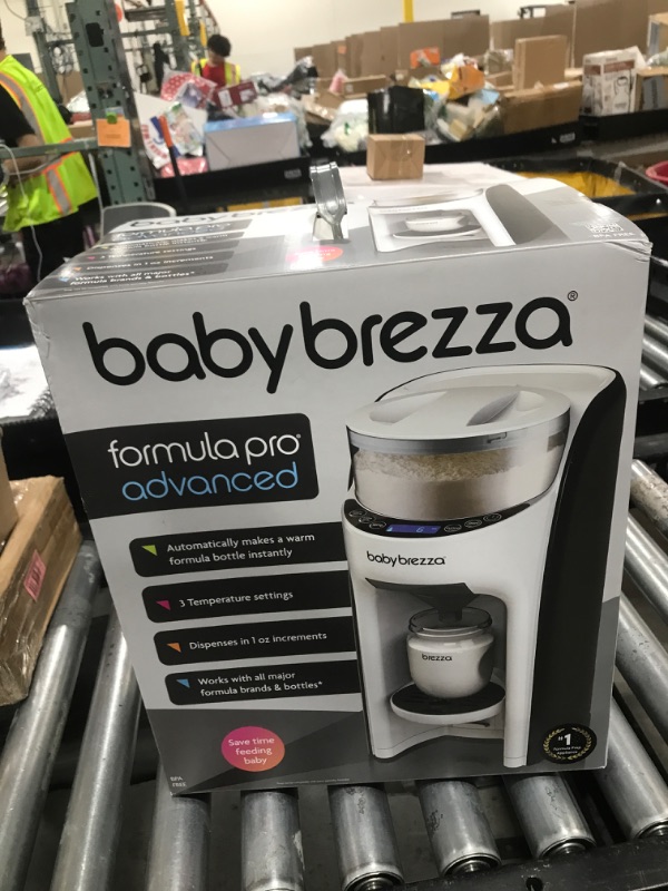 Photo 1 of Baby Brezza New and Improved Formula Pro Advanced Formula Dispenser Machine - Automatically Mix a Warm Formula Bottle Instantly - Easily Make Bottle with Automatic Powder Blending, White