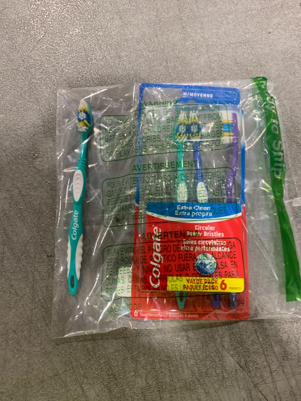 Photo 1 of Colgate Extra Clean Toothbrush, Medium Bulk Toothbrush Pack, Adult Medium Bristle Toothbrushes with Ergonomic Handle and Circular Cleaning Bristles, Helps Remove Surface Stains, 6 Pack