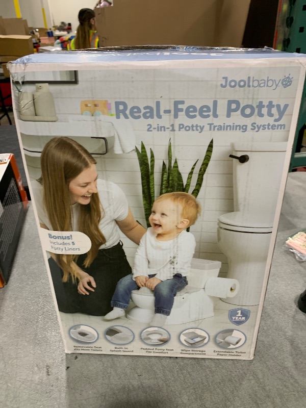 Photo 1 of Real Feel 2-in-1 Potty with Wipes Storage, Flushing Sounds & Disposable Liners - Realistic Toilet - Easy to Clean & Assemble - Jool Baby (Gray)