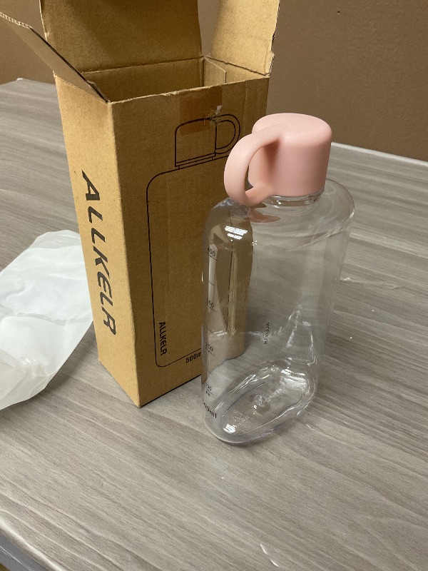 Photo 1 of ALLKELR Portable Flat Water Bottle, BPA Free Tritan Plastic Travel Water Bottle for Camping, Fitness, Outdoor Sports, Fits Purse and Pocket (Pink, 16.9 oz)