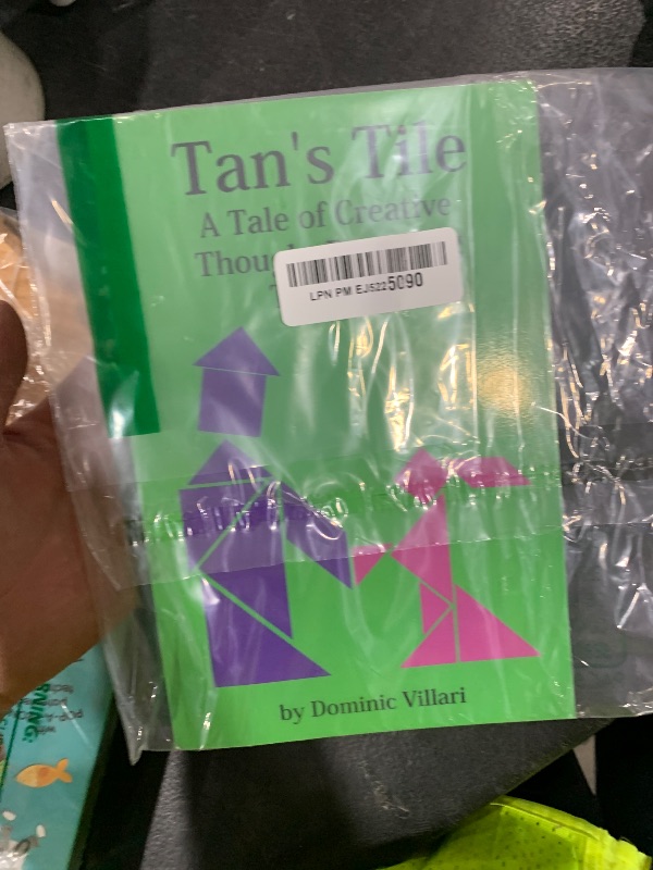 Photo 1 of Tan's Tile: A Tale of Creative Thought Featuring Tangram (Tangram Tales)
