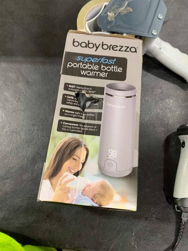 Photo 1 of Baby Brezza Superfast Portable Baby Bottle Warmer – 67% Faster - Travel Breastmilk Warmer and Formula Warmer - Safe, Even Heating - Up to 9oz - No Adapters, Grey
