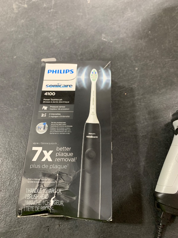 Photo 1 of Philips Sonicare 4100 Rechargeable Electric Toothbrush, with Pressure Sensor, 2 Intensity Settings, SmarTimer and QuadPacer, 14-Day Battery Life, Black, Model HX3681/24