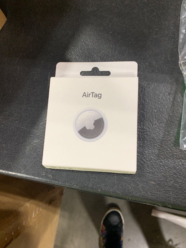 Photo 1 of Apple AirTag. Keep Track of and find Your Keys, Wallet, Luggage, Backpack, and More. Simple one-tap Set up with iPhone or iPad