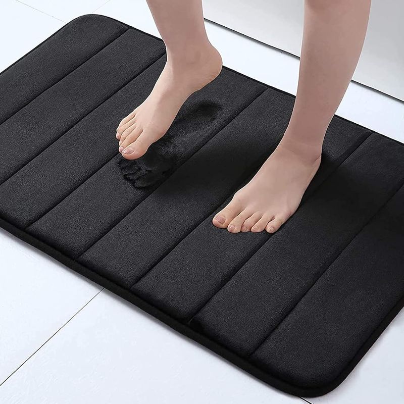 Photo 1 of Buganda Memory Foam Bath Mat, 24" x 16", Ultra Soft and Non-Slip Bathroom Rugs, Water Absorbent and Machine Washable Bath Rug for Bathroom, Shower, and Tub, Black