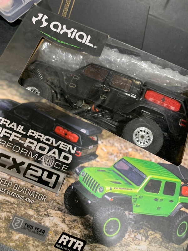 Photo 1 of Axial RC Truck SCX24 Jeep Gladiator 4 Wheel Drive Rock Crawler Brushed RTR (Nothing Needed to Complete Ready-to-Run), Black, AXI00005V2T5, Remote Control Car, RC Car, RC Crawler