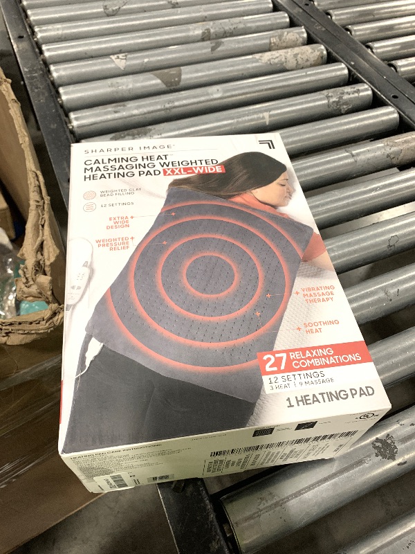Photo 1 of Calming Heat XXL-Wide Massaging Weighted Heating Pad by Sharper Image- Electric Heating Pad with Massaging Vibrations, Auto-Off, 12 Settings- 3 Heat, 9 Massage- 27 Relaxing Combos, 20” x 24”, 5 lbs