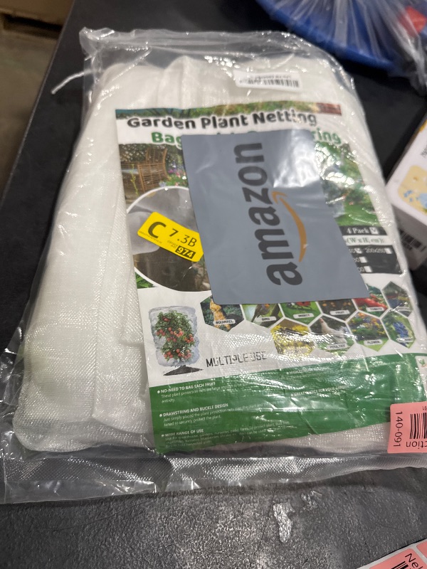 Photo 1 of Evoio 4 Pcs Garden Plant Fruit Tree Bird Netting Protection Blueberry Bushes Netting Covers Bags with Drawstring, 4 x 4.6 ft Shrubs Bush Tomato Strawberry Berry Barrier Mesh Cover Net Protector