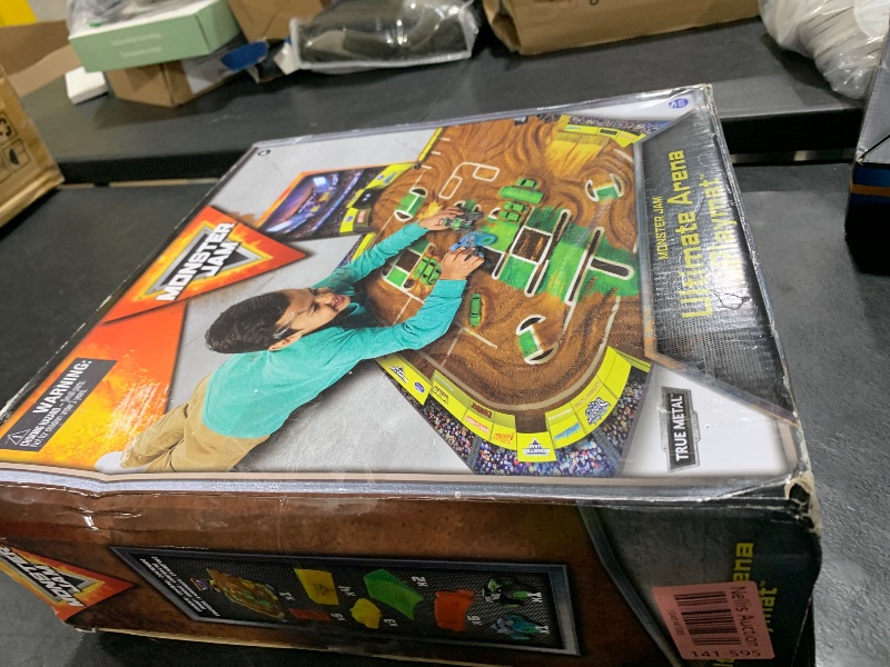 Photo 1 of Monster Jam, Ultimate Arena Playmat & Storage with 2 Exclusive Monster Trucks, 1:64 Scale, 20 Accessories, Kids Toys for Boys and Girls Ages 4 and Up