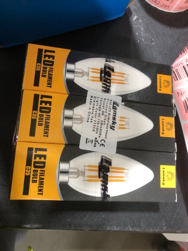 Photo 1 of Lamsky LED Candelabra Bulb 4W Dimmable 40W Equivalent,Frosted Glass Flame Tip Shape,E26 Base 2700K Warm White Decorative Chandelier Light Bulbs,3-Pack