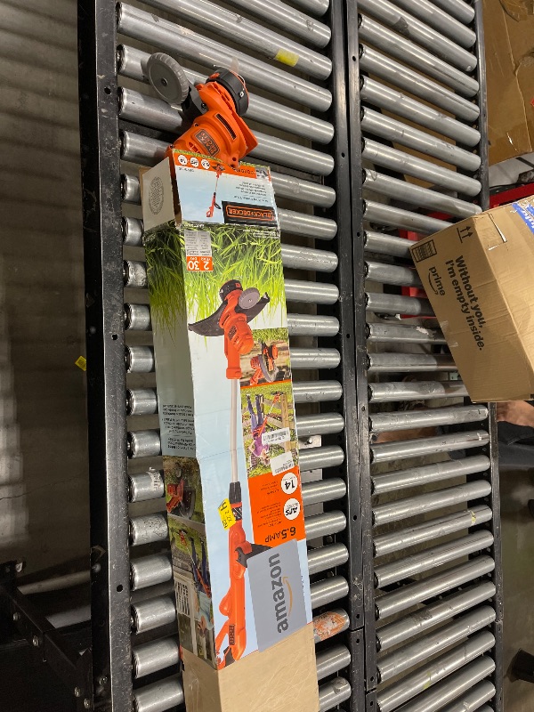 Photo 1 of BLACK+DECKER String Trimmer Weed Wacker with Auto Feed Weed Eater, 6.5-Amp, 14-Inch (BESTA510)