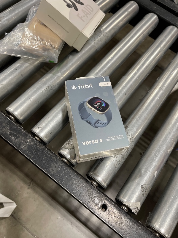 Photo 1 of Fitbit Versa 4 Fitness Smartwatch with Daily Readiness, GPS, 24/7 Heart Rate, 40+ Exercise Modes, Sleep Tracking and more, Waterfall Blue/Platinum, One Size (S & L Bands Included)