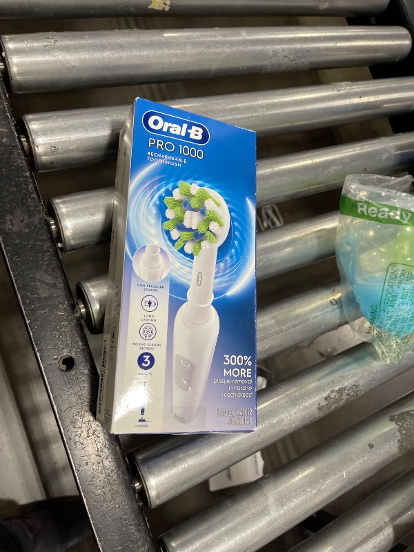 Photo 1 of Oral-B Pro 1000 Rechargeable Electric Toothbrush, White