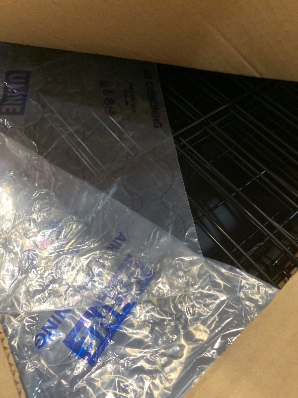 Photo 1 of Amazon Basics Durable, Foldable Metal Wire Dog Crate with Tray, Single Door, 48 x 30 x 32.5 in, Black