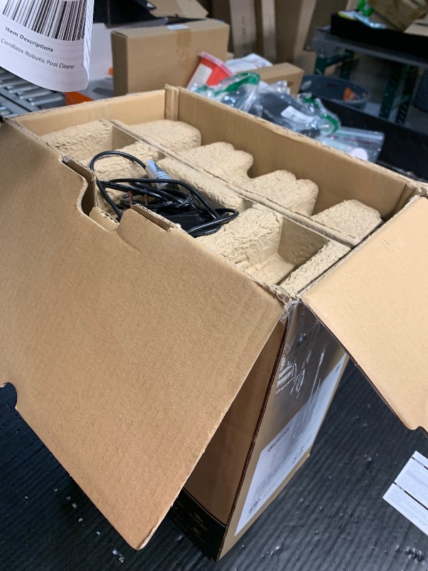 Photo 1 of **ITEM IS NONFUNCTIONAL, FOR PARTS**
Cordless Robotic Pool Cleaner