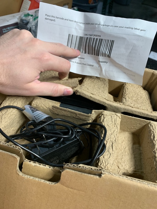 Photo 1 of **ITEM IS NONFUNCTIONAL, FOR PARTS**
Cordless Robotic Pool Cleaner