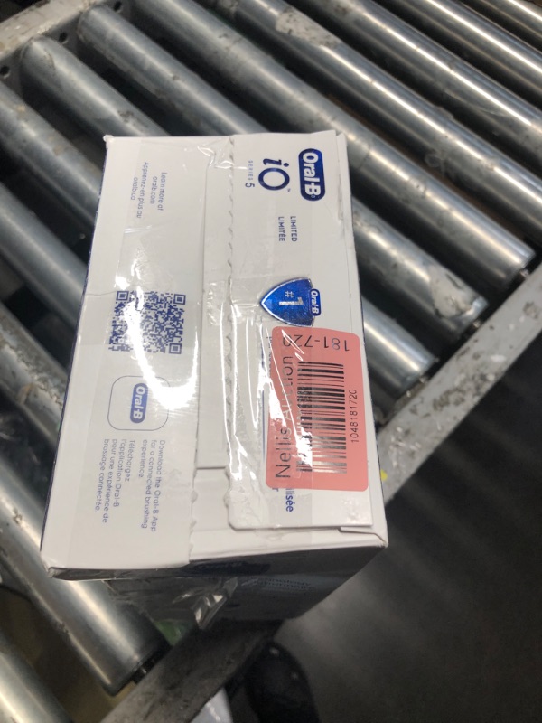 Photo 1 of Oral-B iO Deep Clean + Whiten Rechargeable Electric Toothbrush with Visible Pressure Sensor, 2 Minute Timer, 5 Cleaning Settings, 1 iO5 Limited, 3 Toothbrush Heads, Travel Case & Refill Holder, White