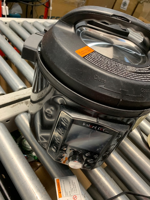 Photo 1 of (used)(damaged)(powers on) Instant® 6qt Pro Electric Pressure Cooker