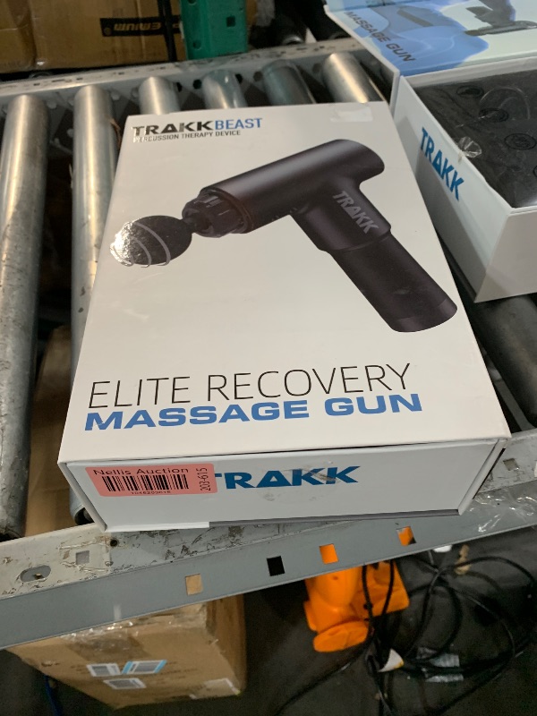 Photo 1 of (FAIR) (MINOR DAMAGE) Trakk Beast Percussion Massage Gun
