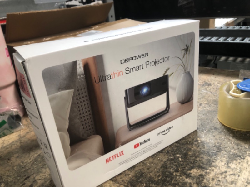 Photo 1 of [Ultra-Slim 1.97"| Netflix Licensed | AI Auto Focus | 360° Stand] Smart Mini Projector with WiFi 6 & Bluetooth, Built-in Netflix/YouTube/Disney+/Hulu, DBPOWER N5 Movie Projector for Bedroom (Black)