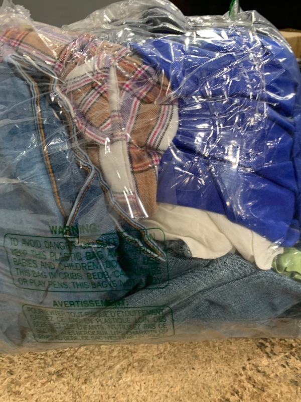 Photo 1 of  ASSORTED CLOTHES DIFFERENT SIZES