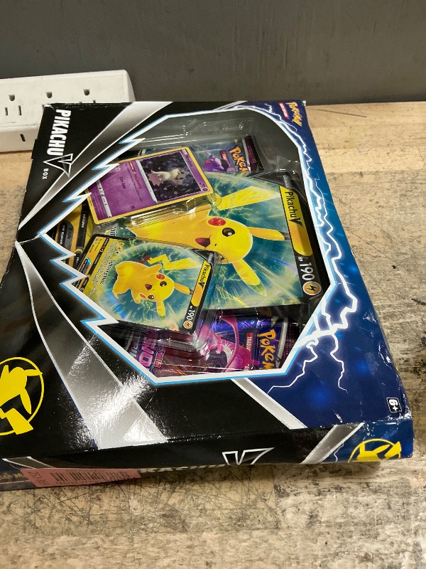 Photo 1 of ****MISSING SOME****  Pokemon TCG Pikachu V Booster Box - 4 Booster Packs + Promo!