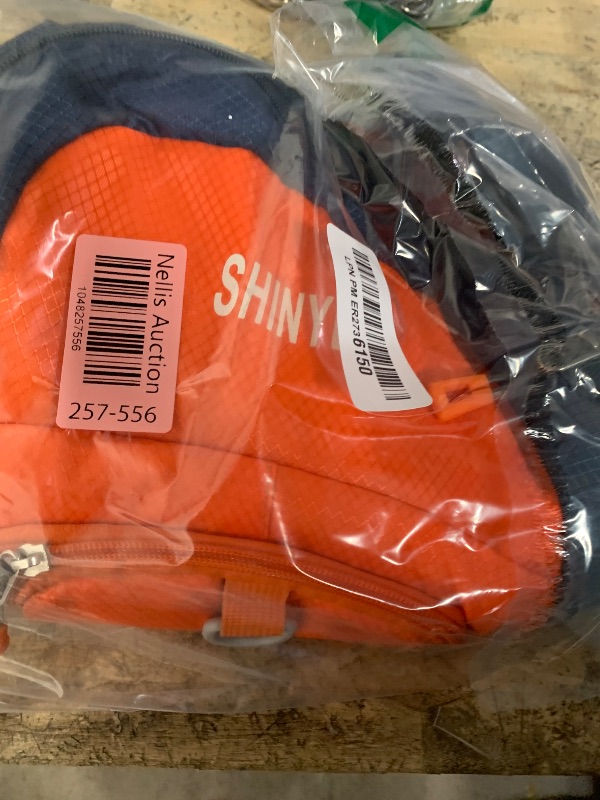 Photo 1 of **HAS MINOR STAINS & DAMAGE**  Shinylin Kids Hydration Backpack with 1.5L Water Bladder Hiking Backpack Lightweight for Boys or Girls Children Biking Climbing Running Cycling(Orange)