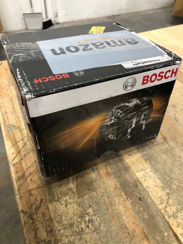 Photo 1 of **HEAVY** Bosch Alternator - AL8670N
