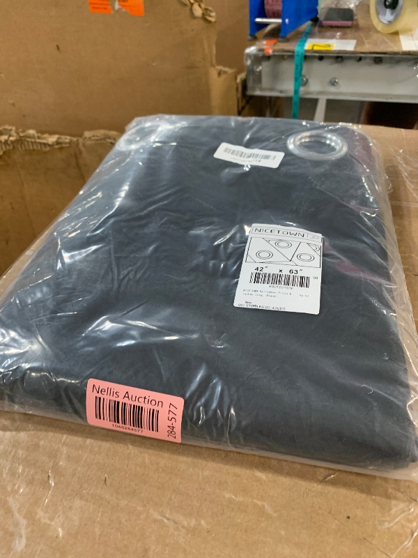Photo 1 of (BAGGED) (USED/FAIR) NICETOWN Halloween Pitch Black Solid Thermal Insulated Grommet Blackout Curtains/Drapes for Bedroom Window (2 Panels, 42 inches Wide by 63 inches Long, Black)